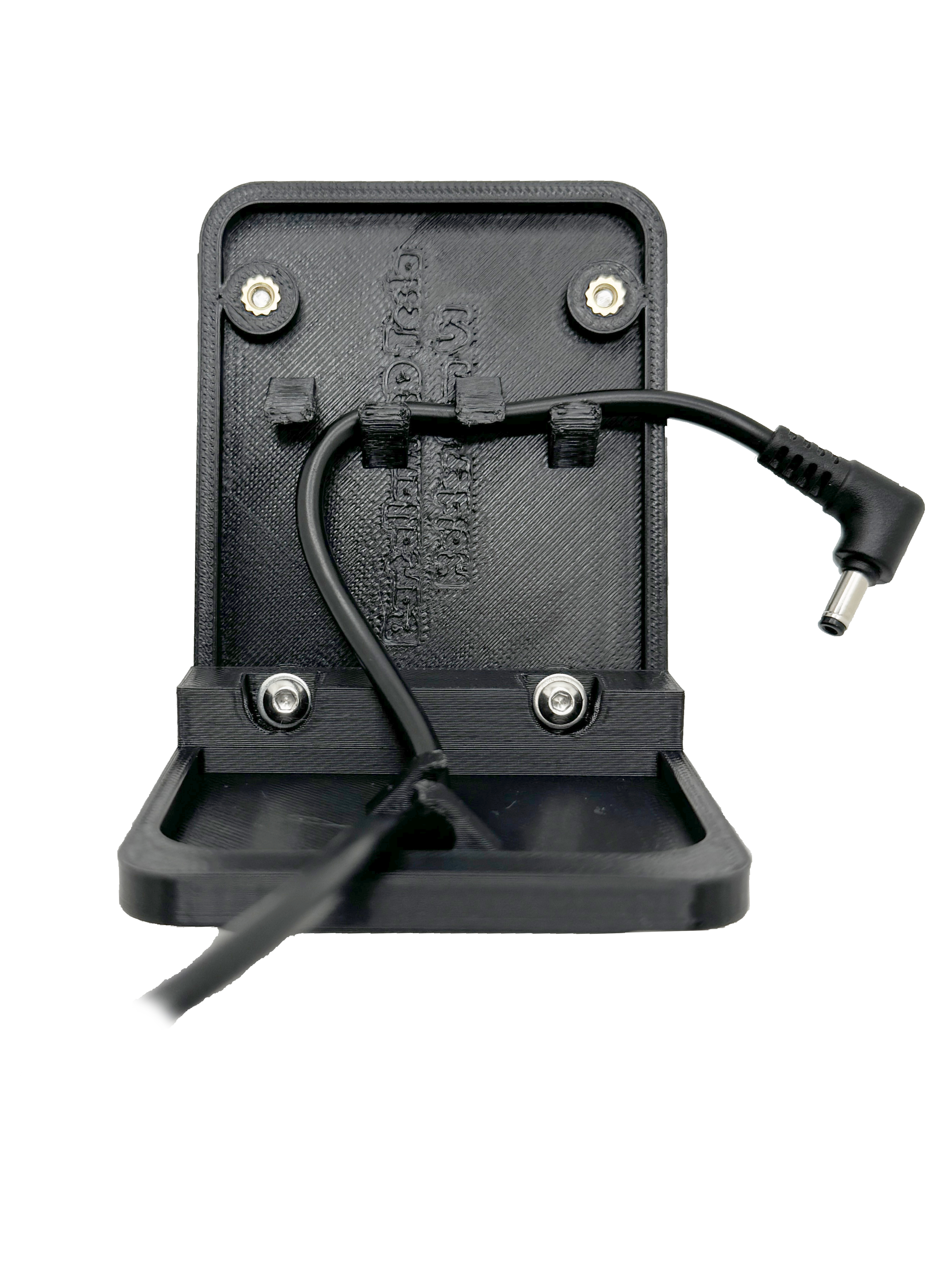 Image of the bottom of the unit showing cable clips with a cable routed through them