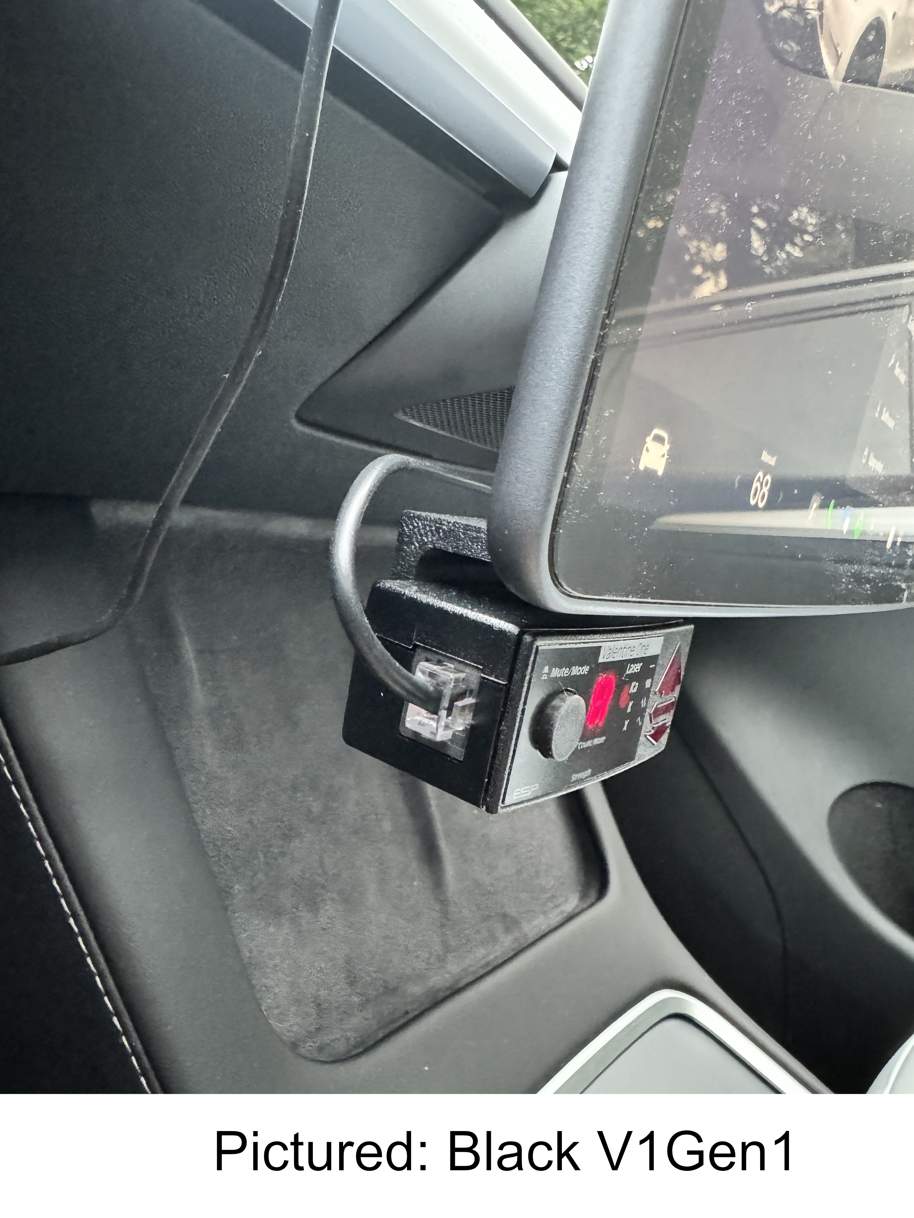 Side view of the display unit mounted on the bottom screen of a Tesla