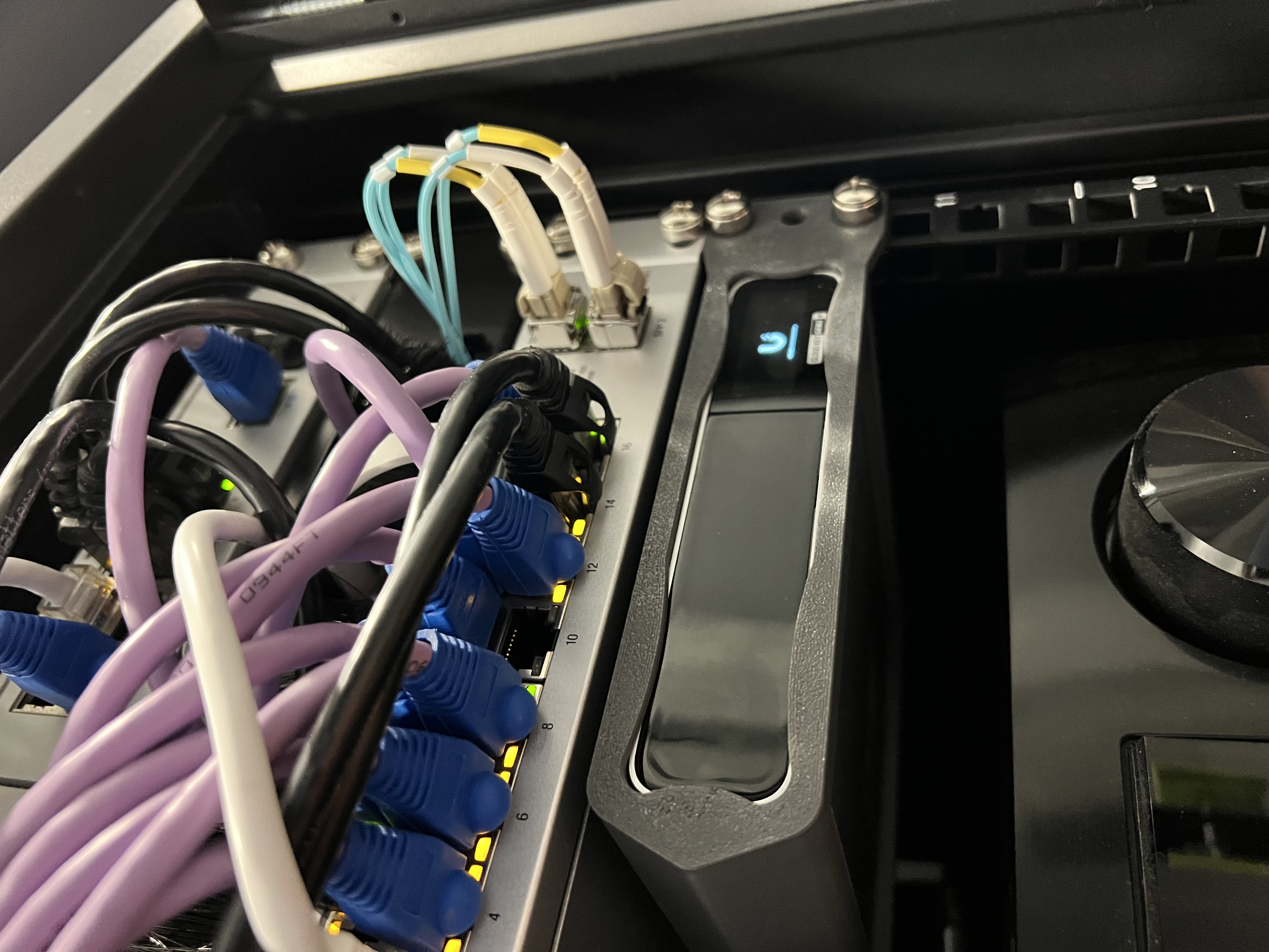 Unit installed in a server rack with a Cloud Key Gen2 installed and powered on